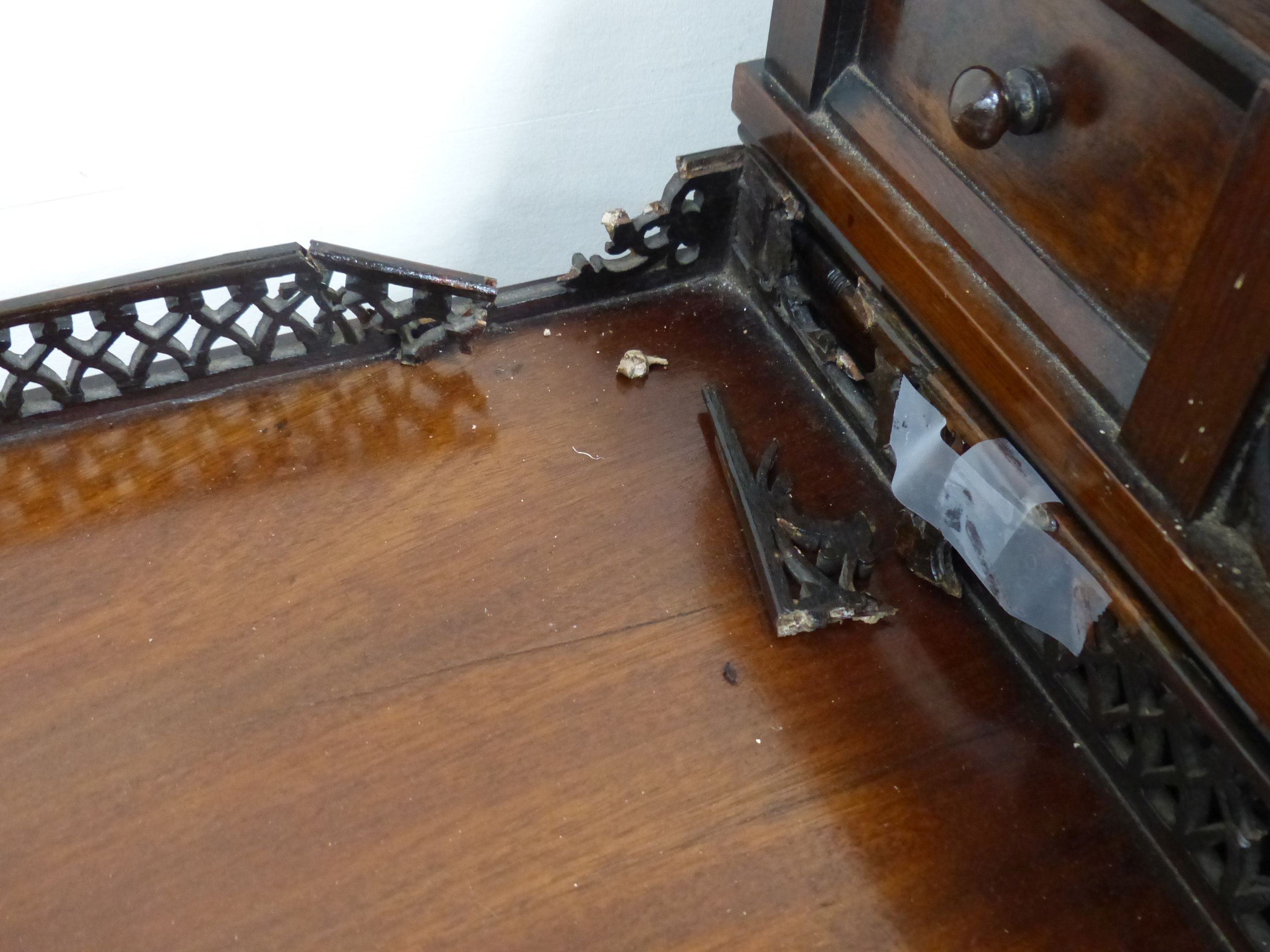 A George III style pierced mahogany side table (with damage), width 72cm, depth 45cm, height 72cm